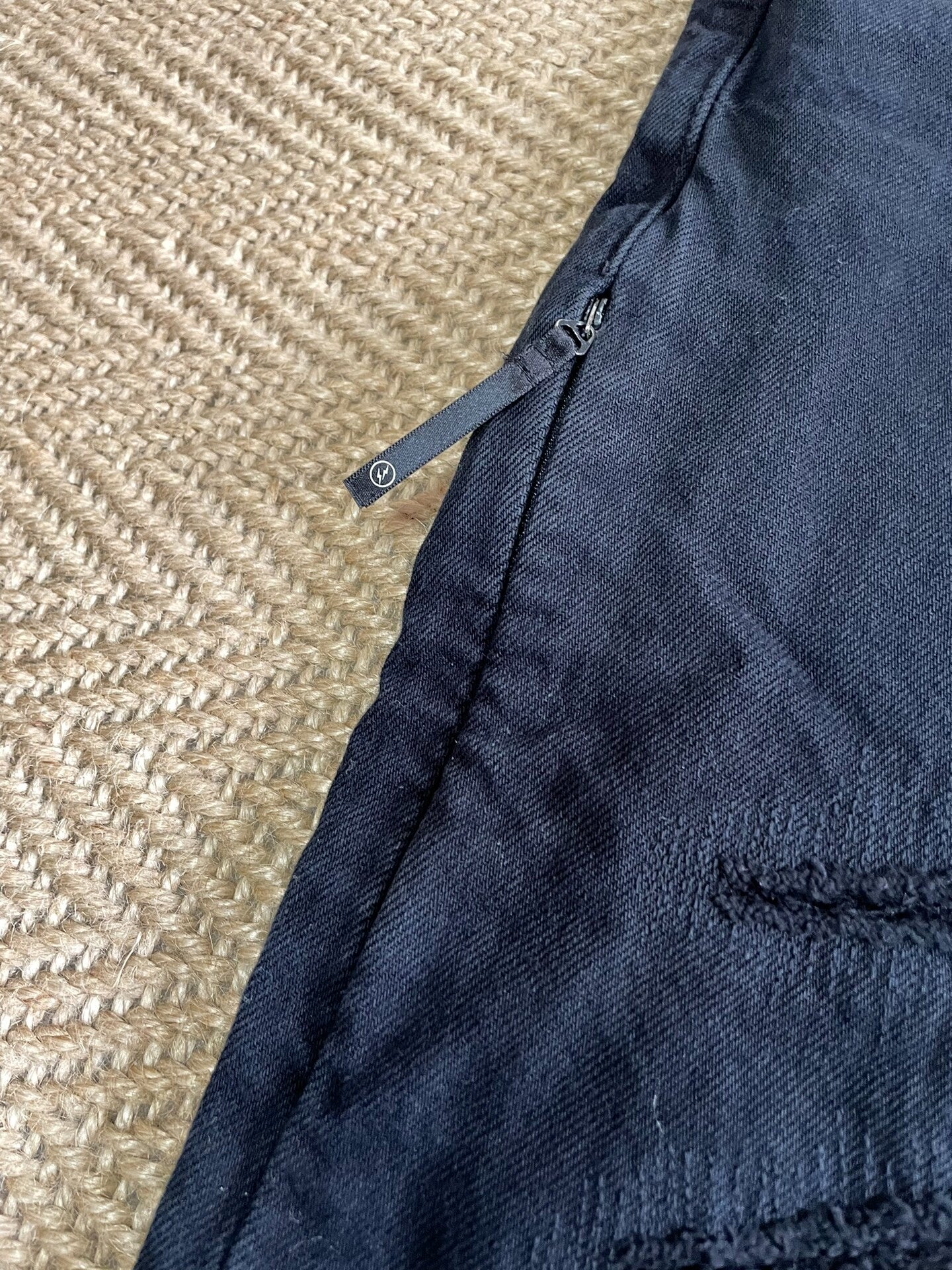 denim by vanquish & fragment distressed jeans