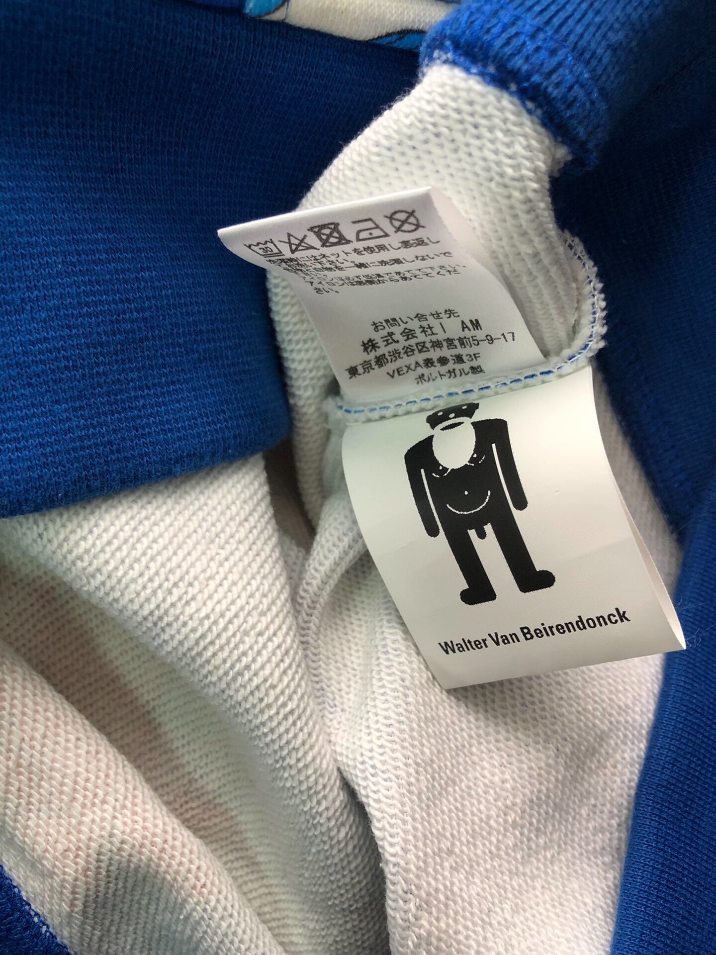 colorful hooded sweatshirt by Walter Van Beirendonck