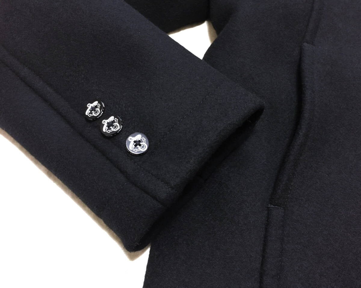 black wool watch coat with single button