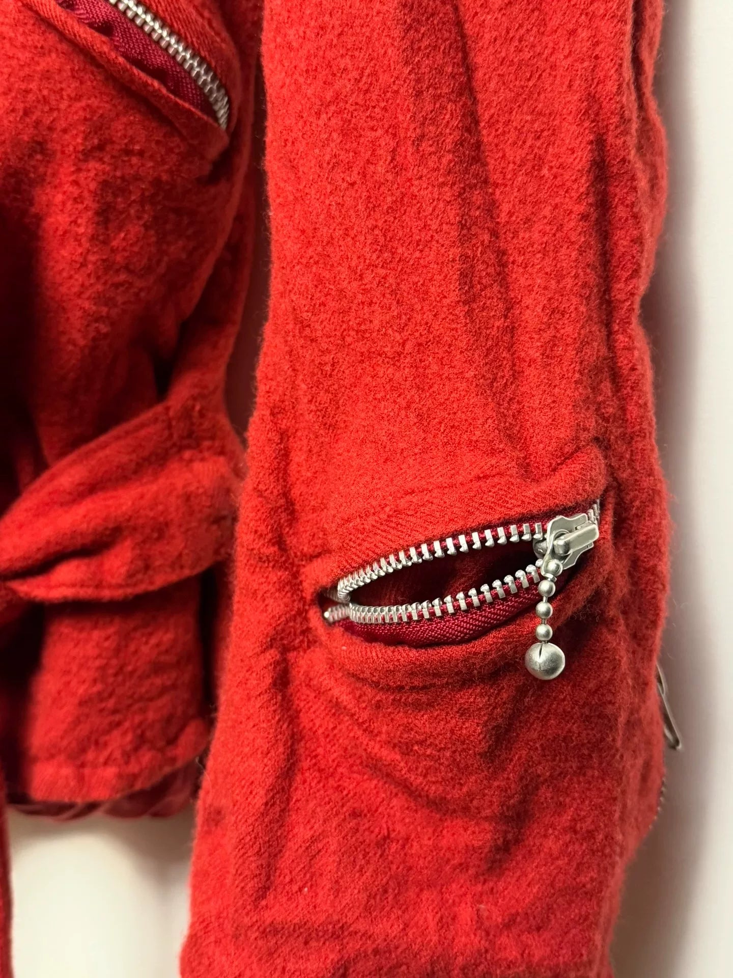 red wool jacket by Junya Watanabe