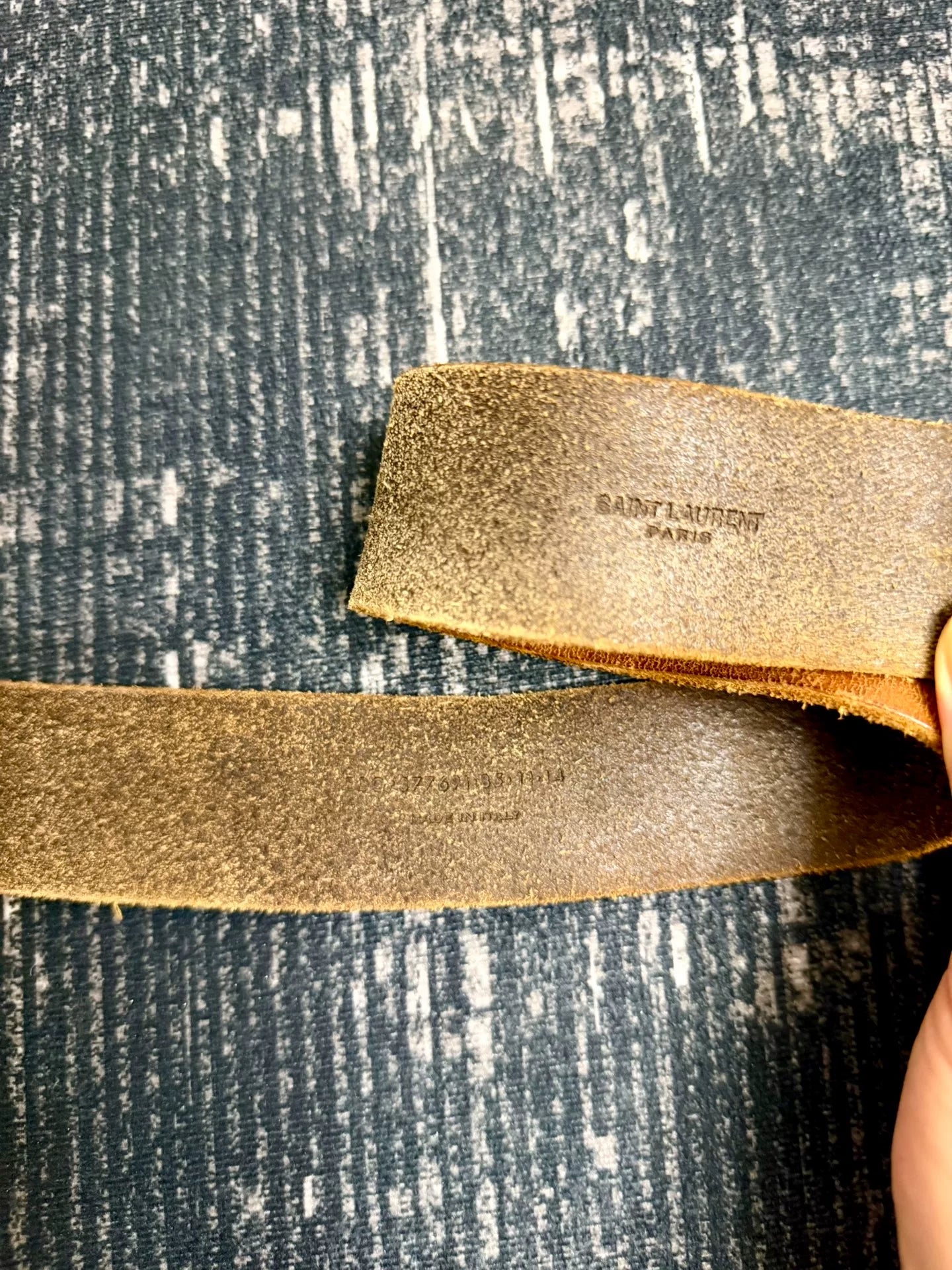 brown leather belt with gold buckle
