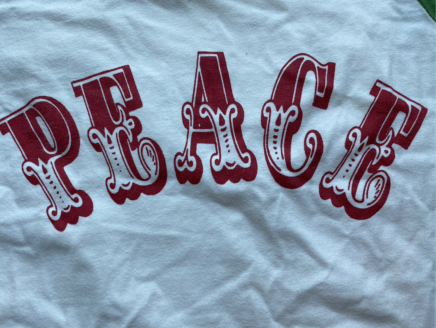 vintage green and white peace tee