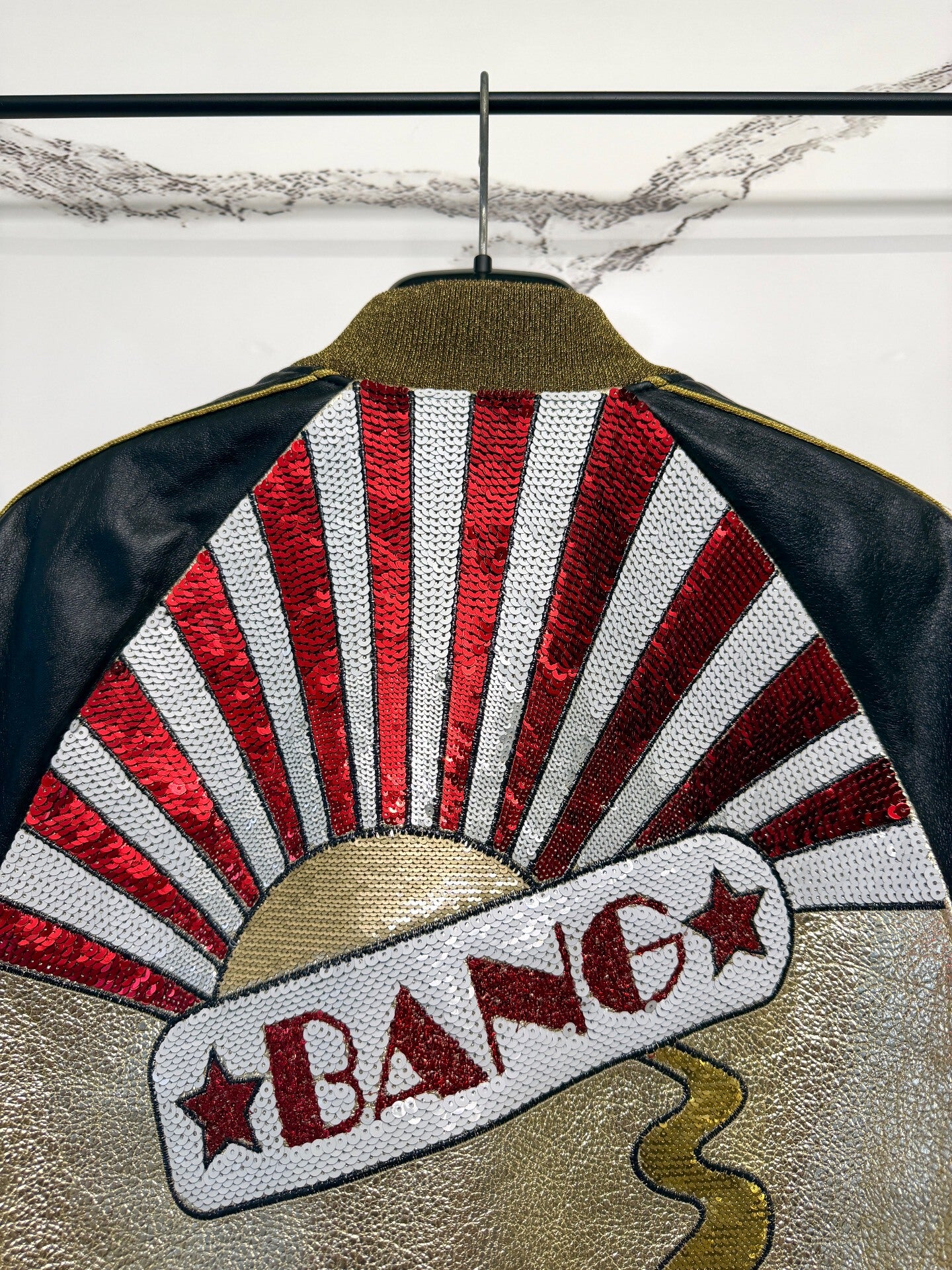 saint laurent gold and black baseball jacket