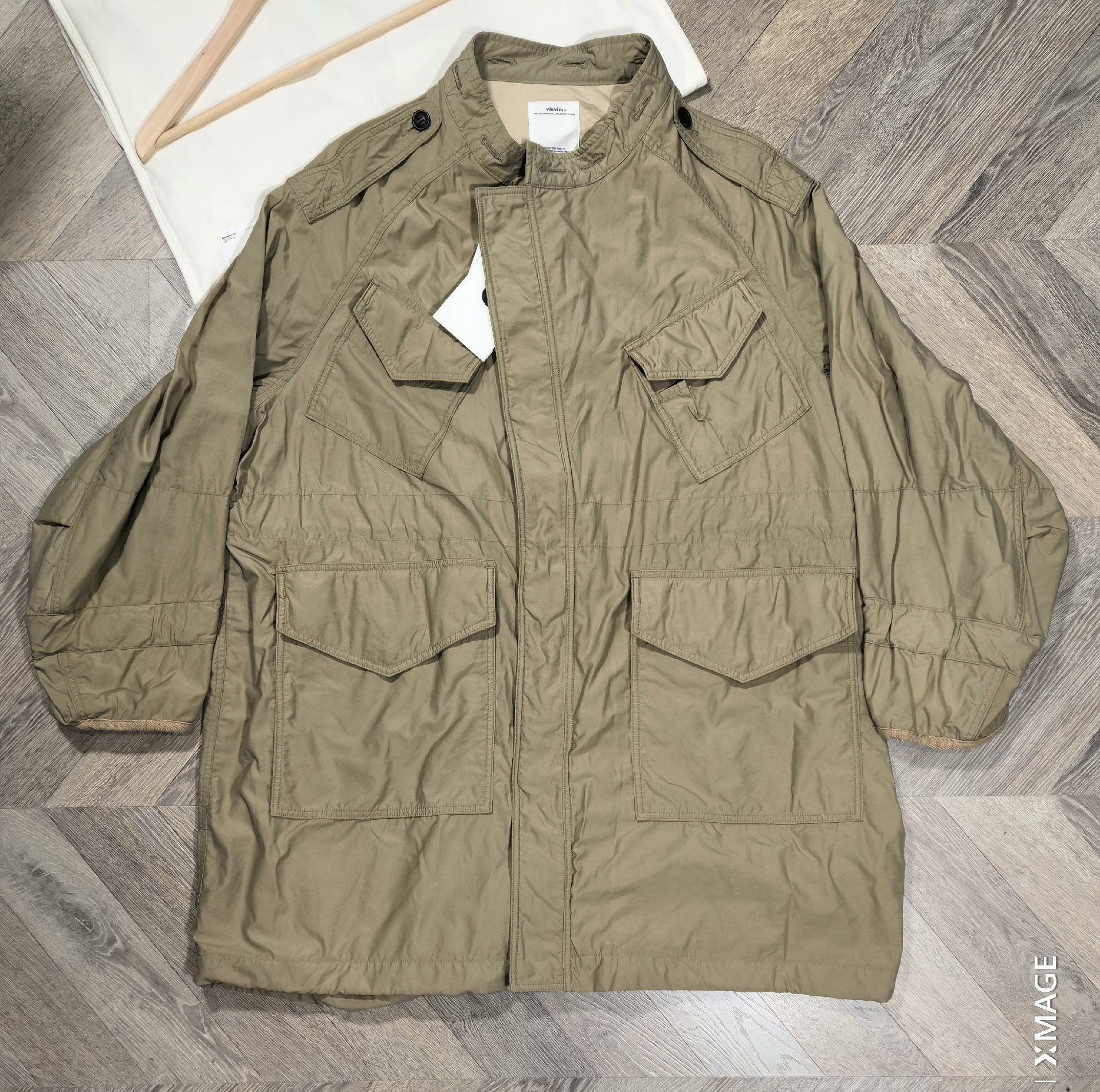 visvim combat coat with mud-dye finish