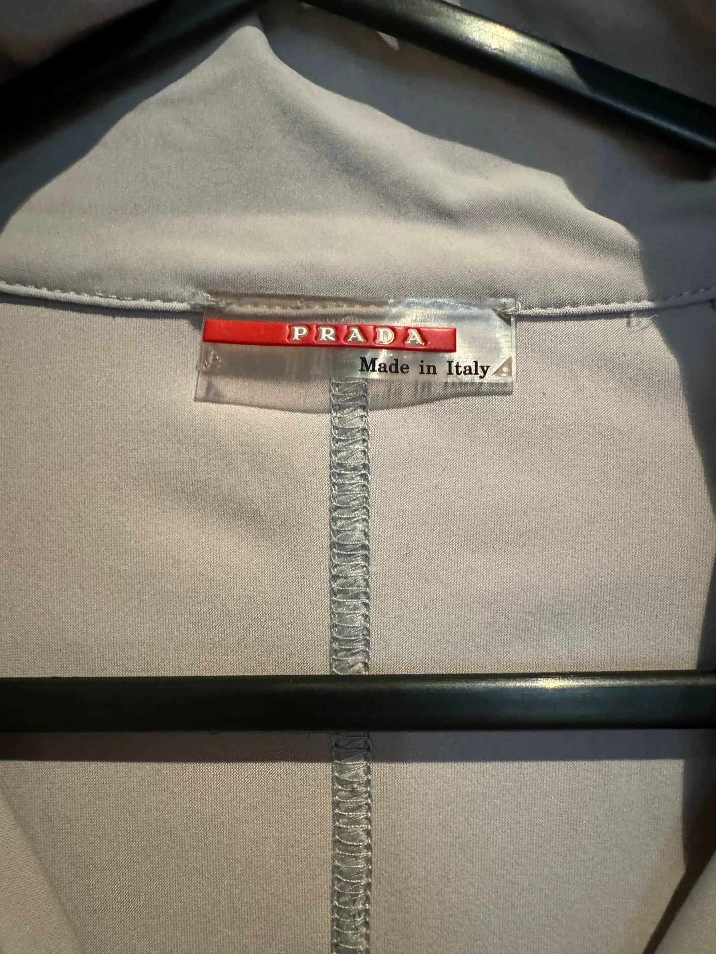 prada sport short jacket with red details