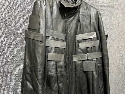 avant-garde leather jacket with metal elements