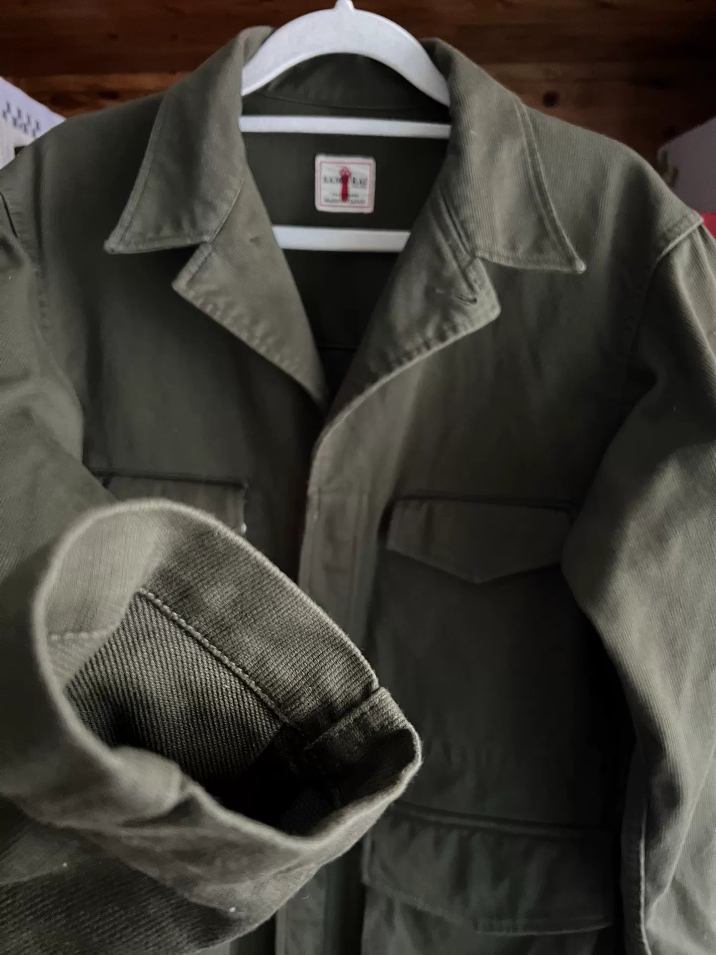 olive green bomber jacket with four pockets