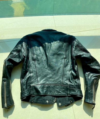 black leather biker jacket with detailed embellishments