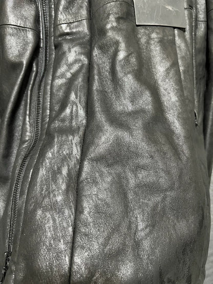 avant-garde leather jacket with metal elements