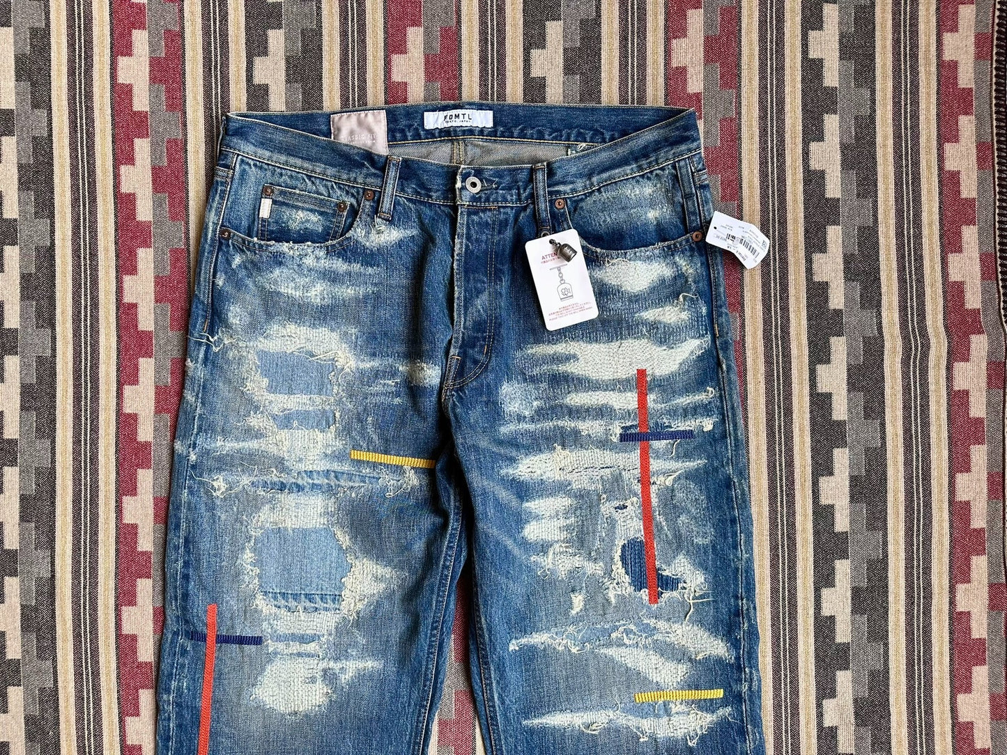 fdmtl classic fit red line distressed jeans