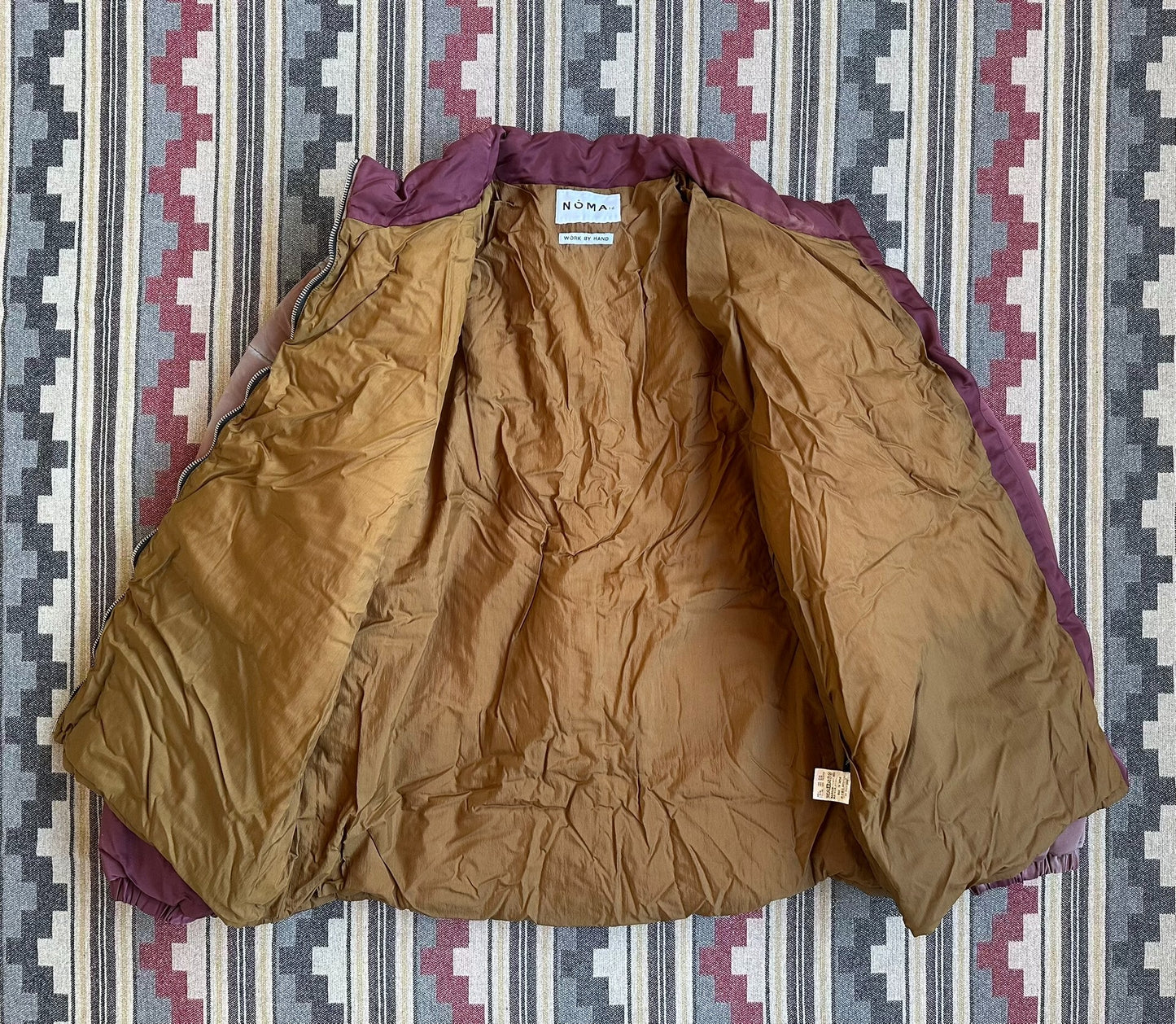 hand dyed puffer jacket in warm tones