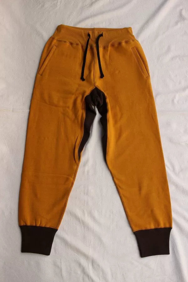 stylish yellow and brown sweatpants