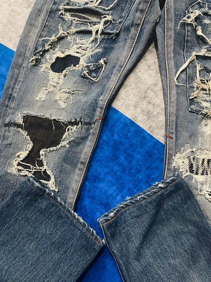 distressed low-rise blue denim jeans