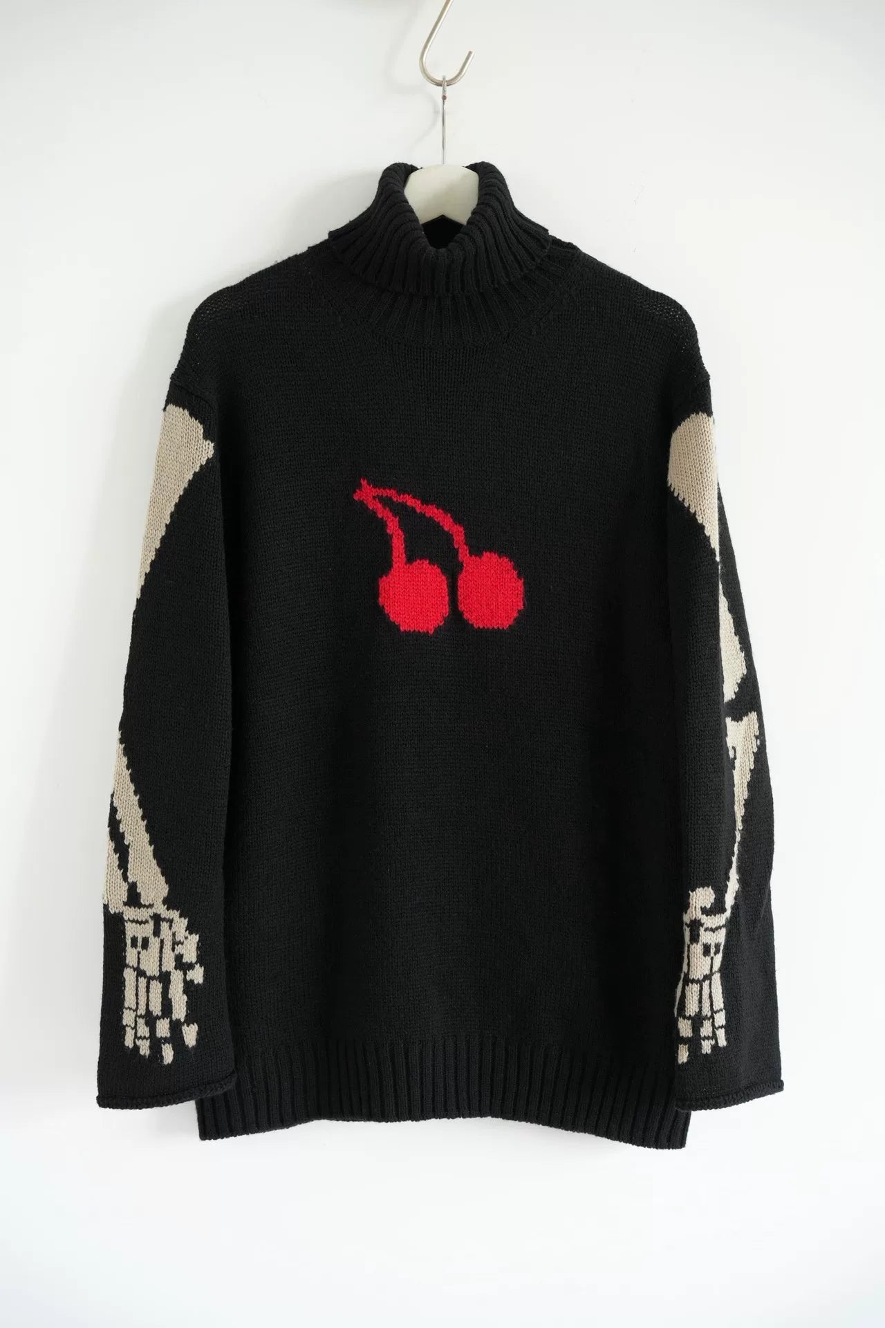 black cherry skeleton turtleneck sweater
