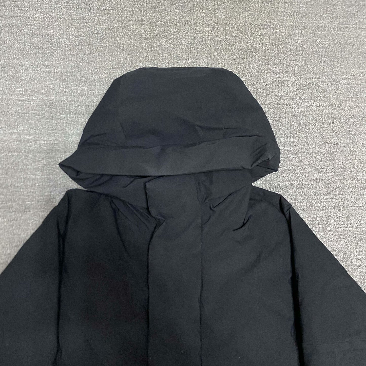 black waterproof puffer jacket by BEAMS