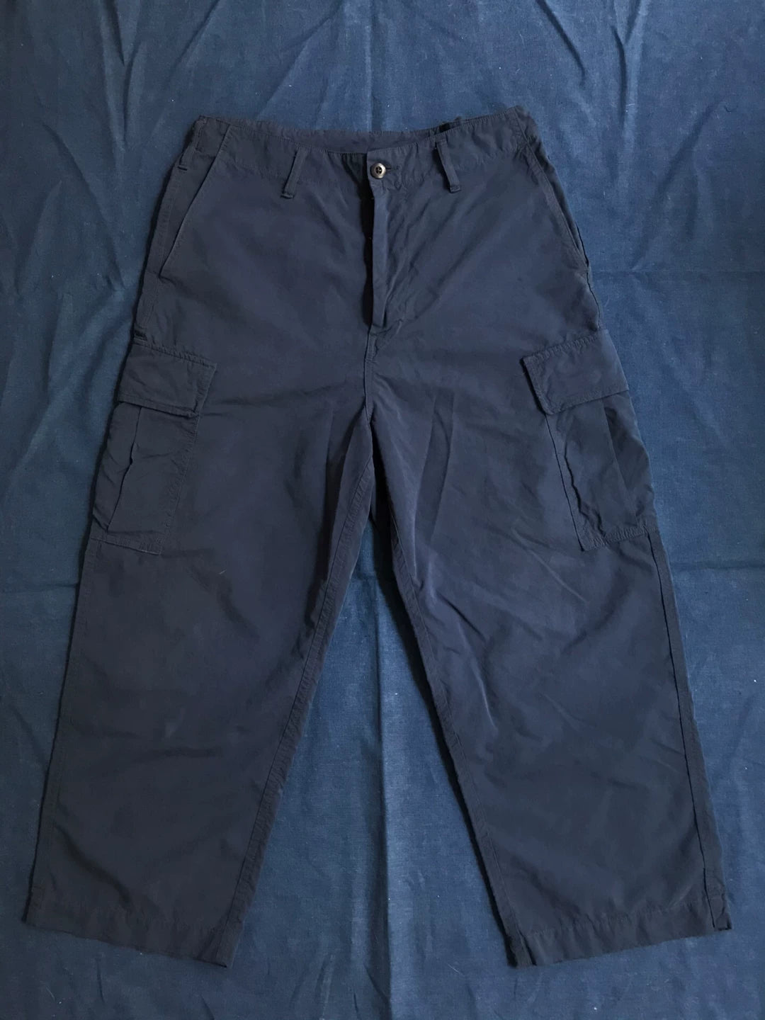 porter classic weather cargo pants in blue
