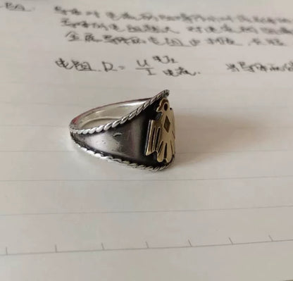 goros eagle ring with silver and gold details