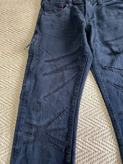 denim by vanquish & fragment distressed jeans