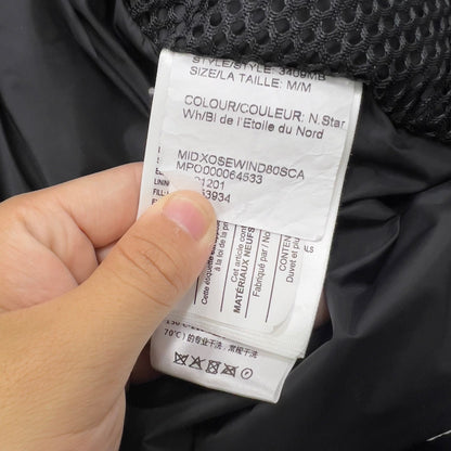 white long parka with black accents