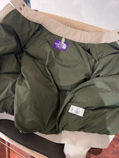 beige north face down jacket