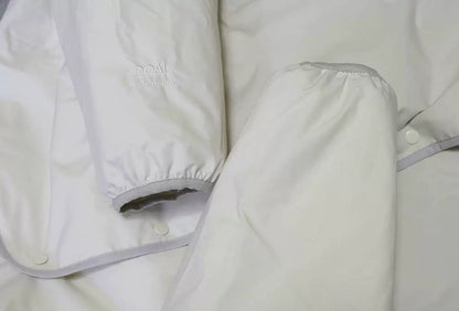 nanamica reversible down cardigan in ecru