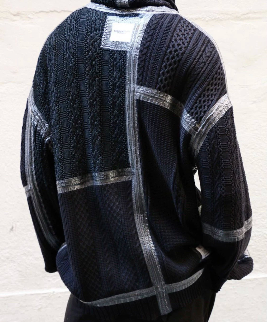 black turtleneck sweater by takahiro miyashita
