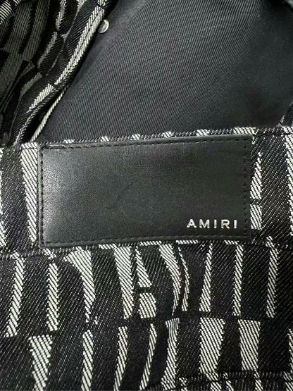 amiri logo detail side button jeans