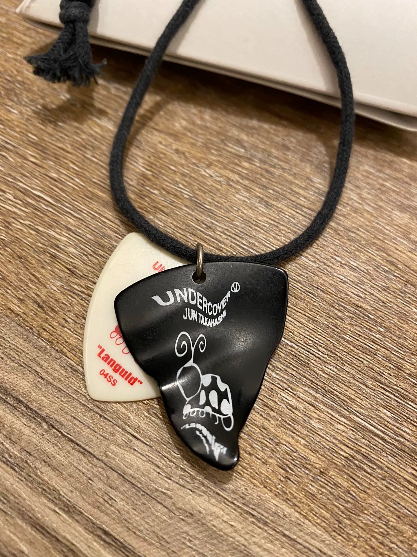 Undercover 04SS Dissolved Guitar Pick Necklace