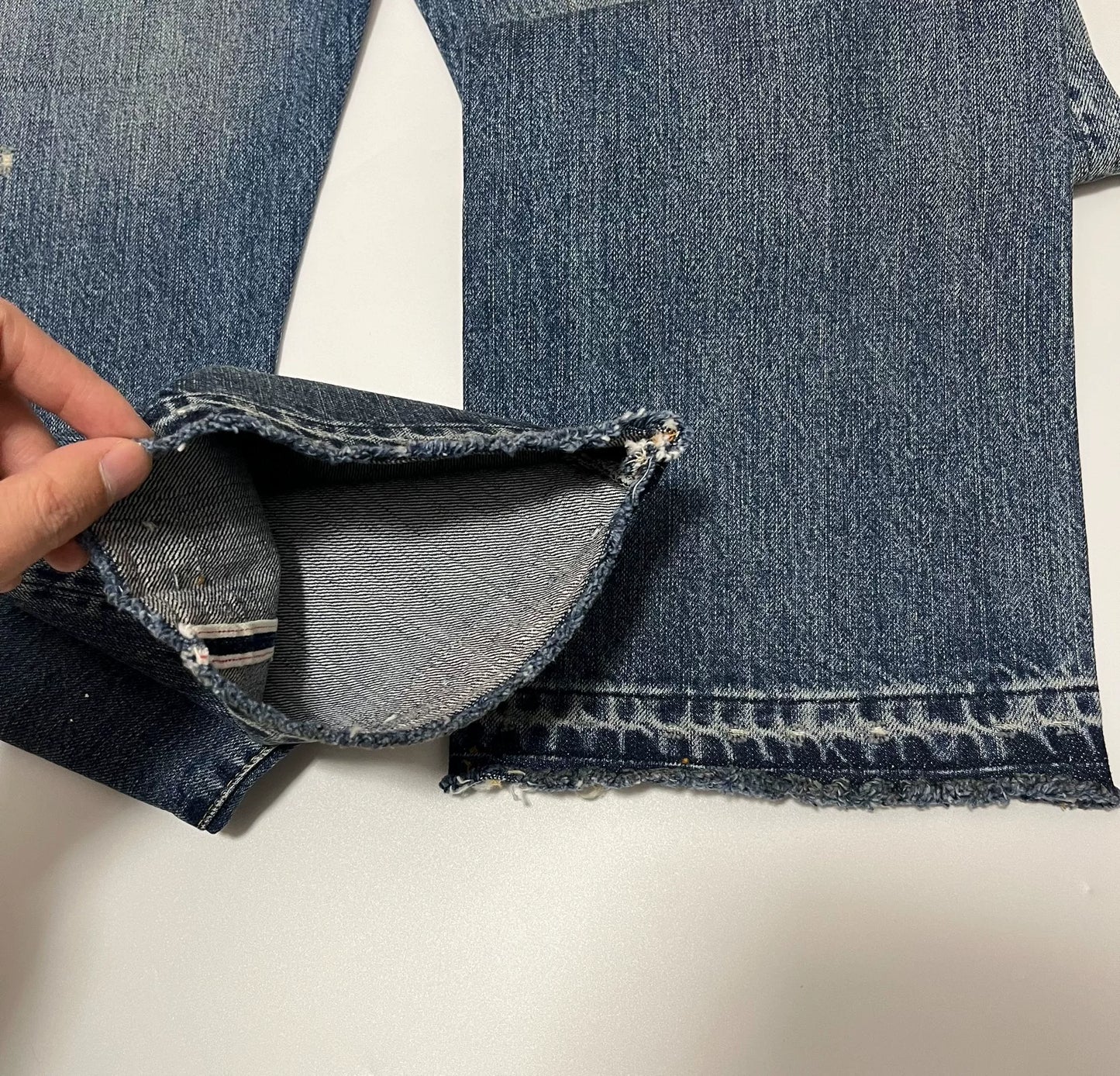 vintage distressed denim jeans by levi's