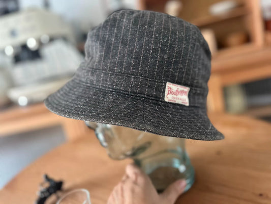 unique gray bucket hat with logo patch
