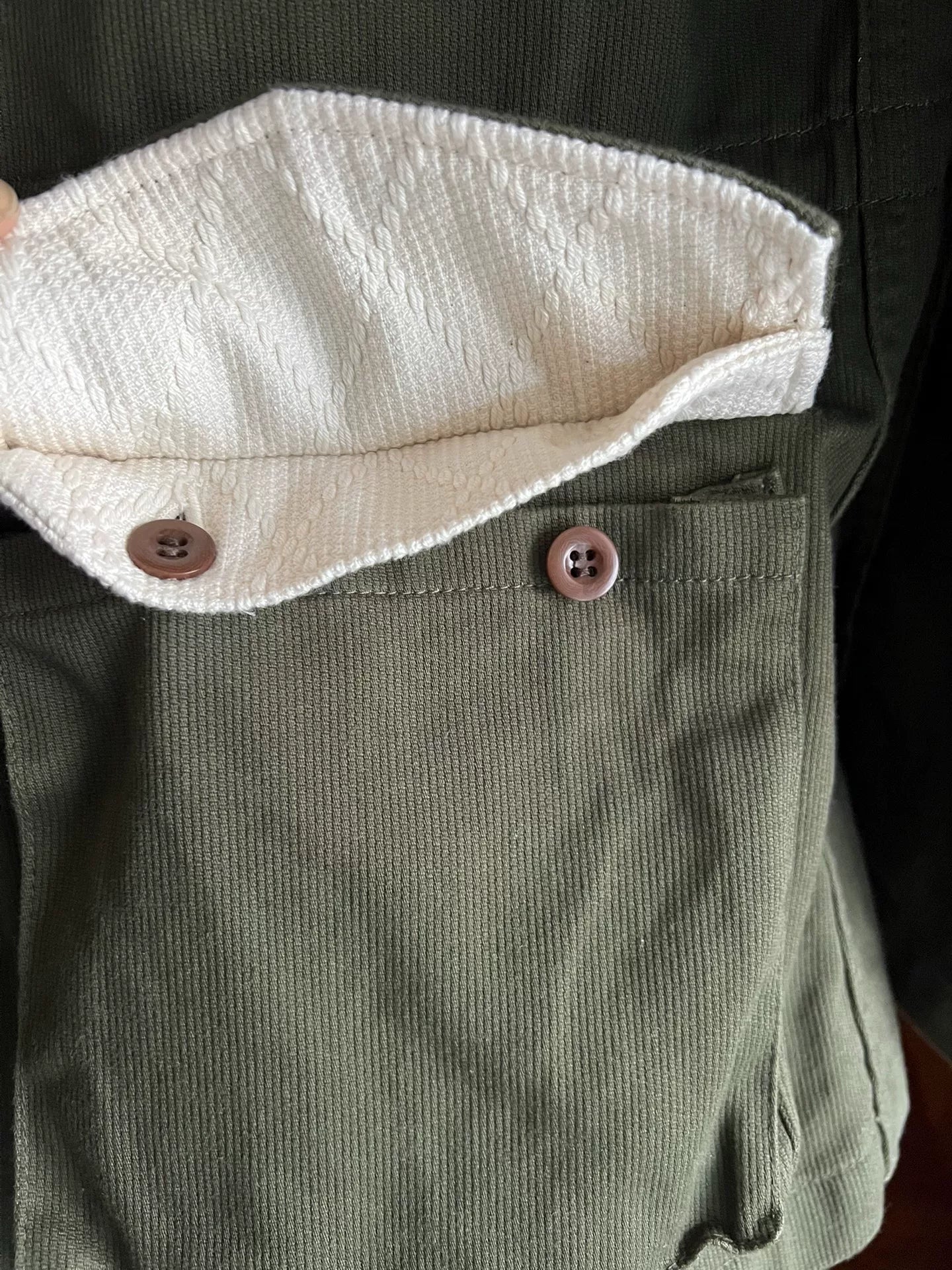 olive green bomber jacket with four pockets