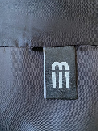 beige baseball jacket with leather sleeves