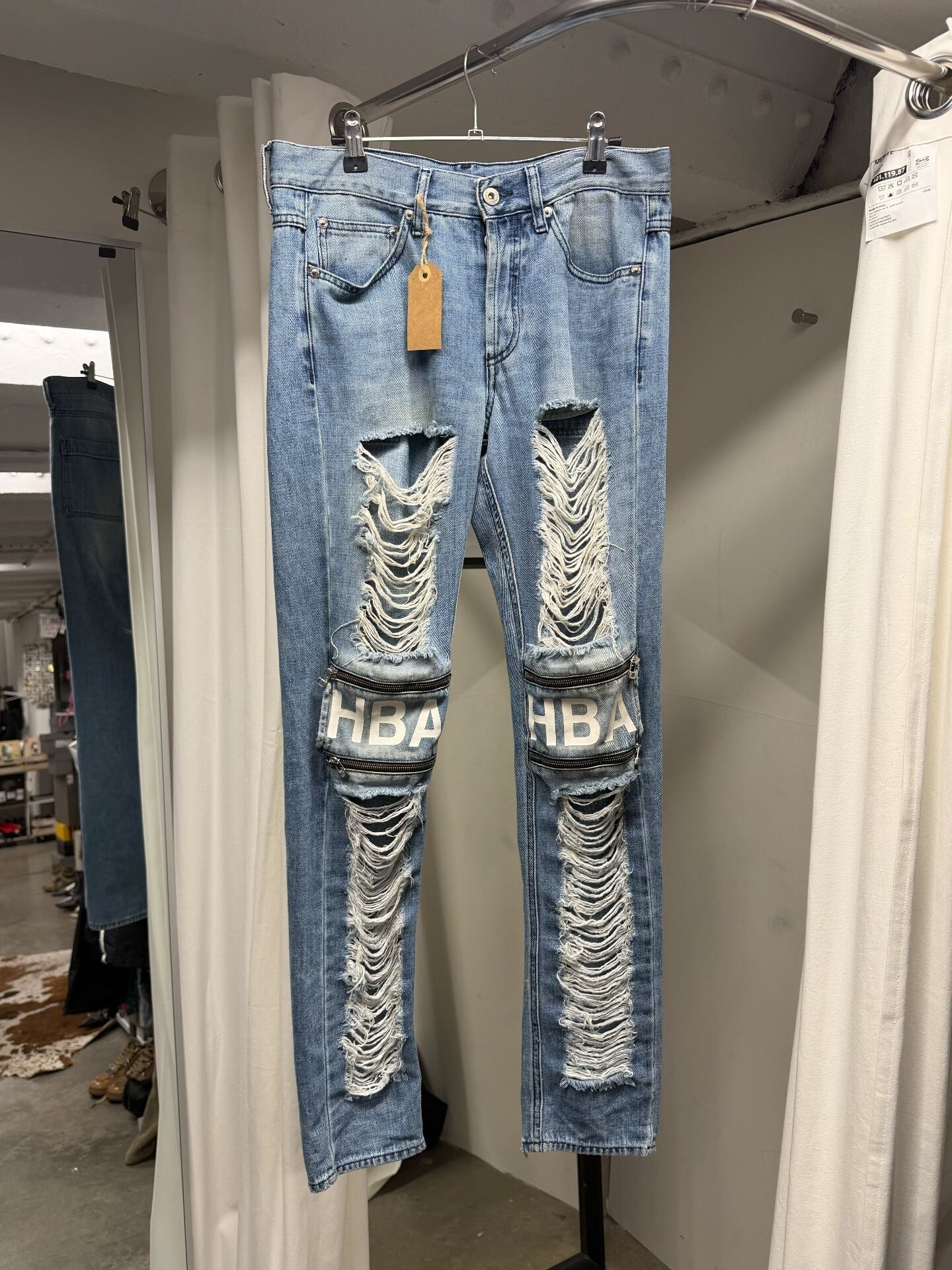 blue shredder zip jeans with distressed details