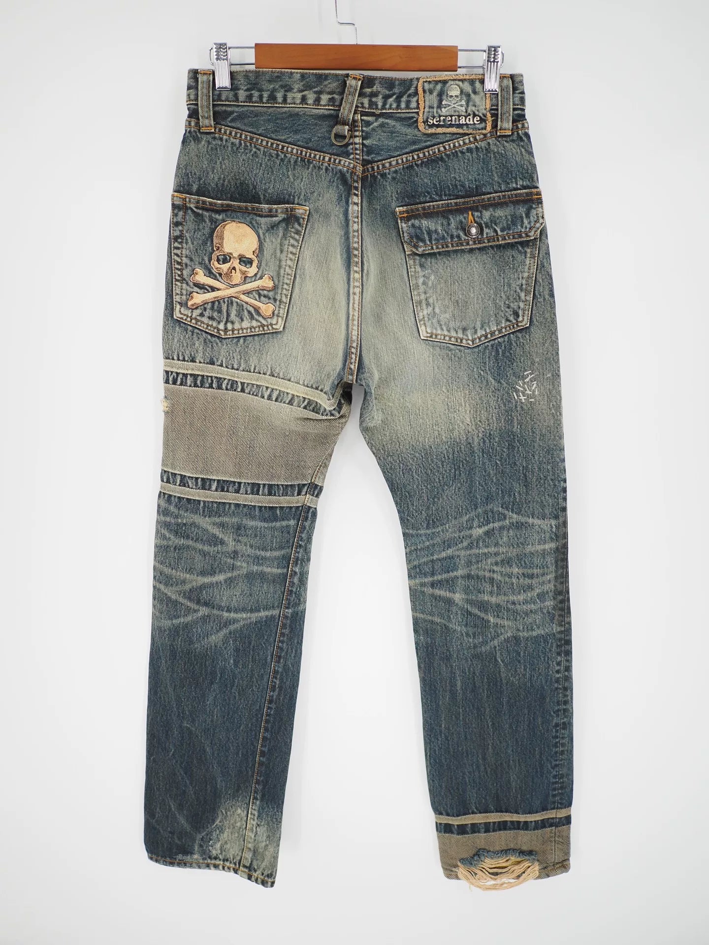 blue denim jeans with gold detail