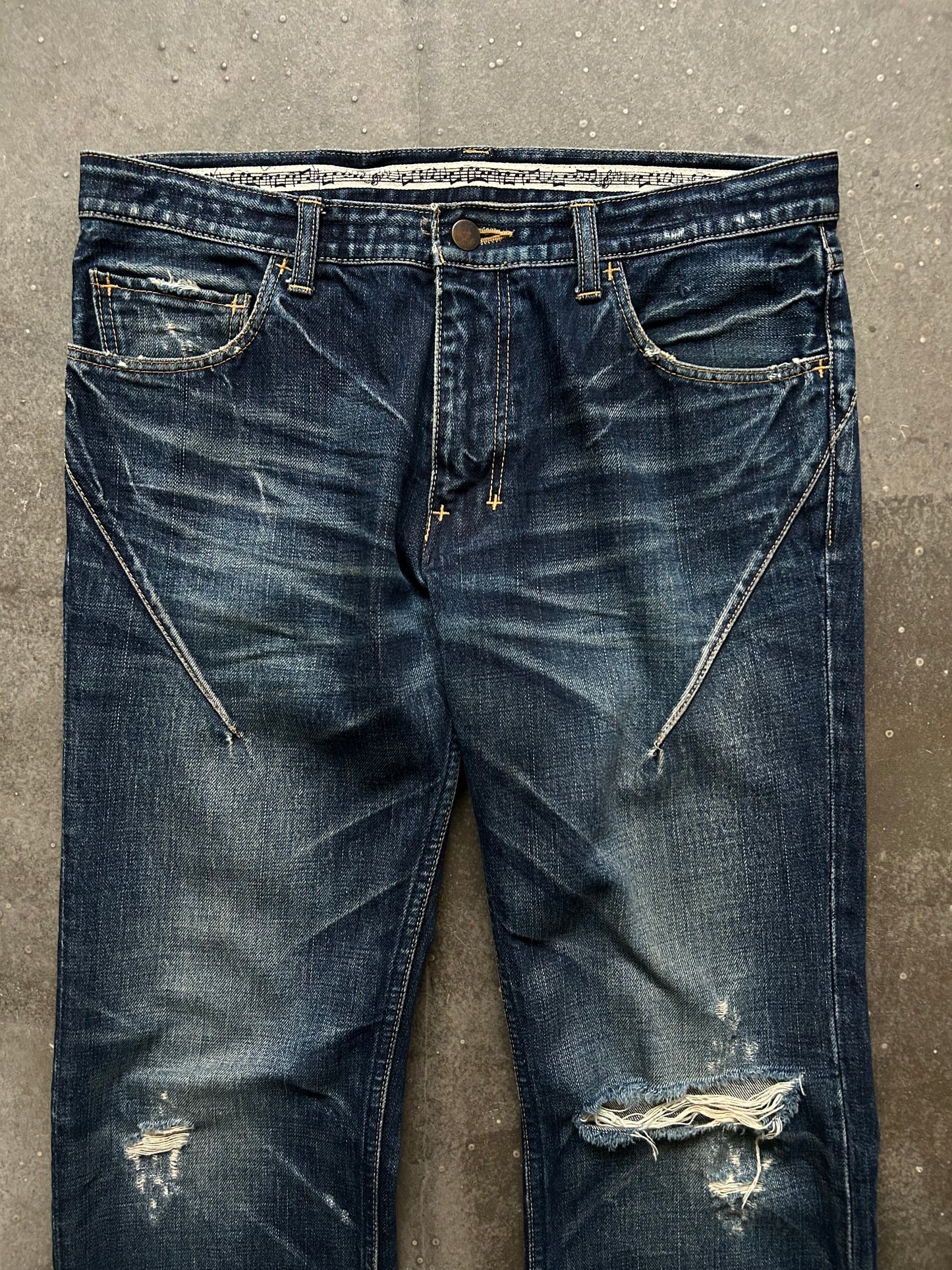 distressed washed denim pants by number nine
