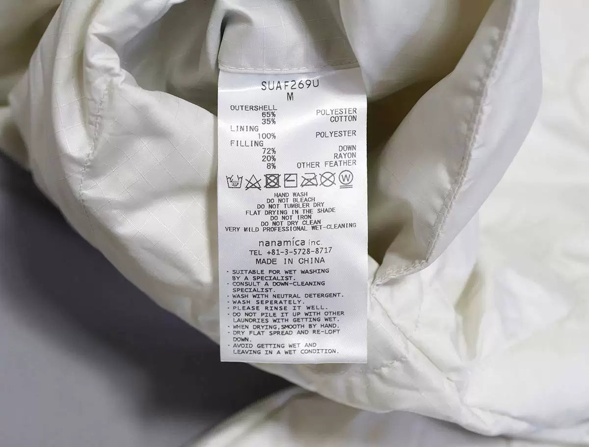 nanamica reversible down cardigan in ecru