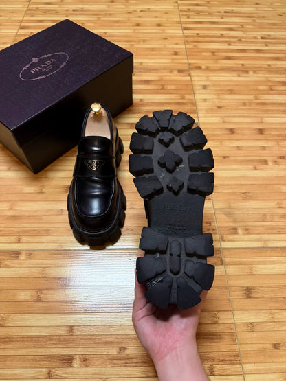 prada black leather platform shoes with logo