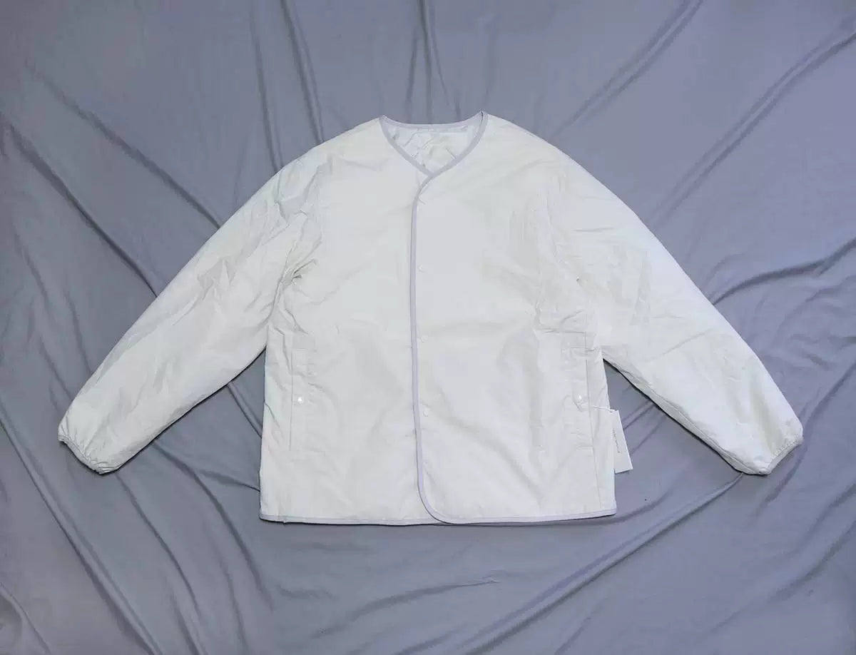 nanamica reversible down cardigan in ecru