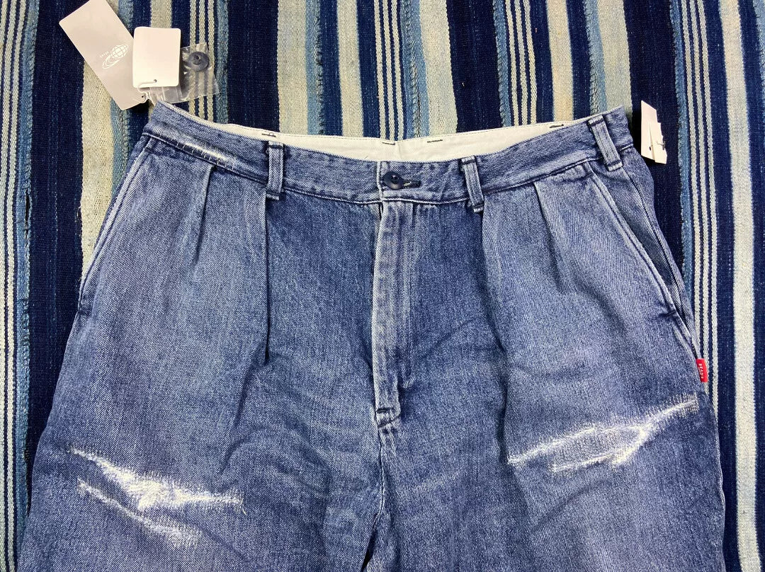 washed blue tapered denim pants for men