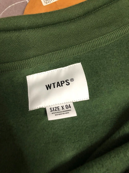 wtaps green pullover sweatshirt with text