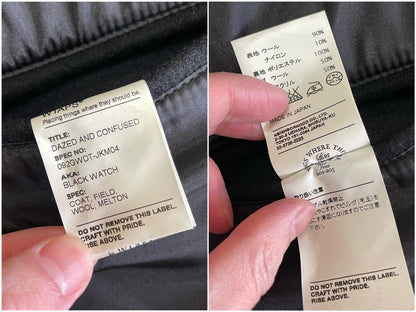 black wool watch coat with single button