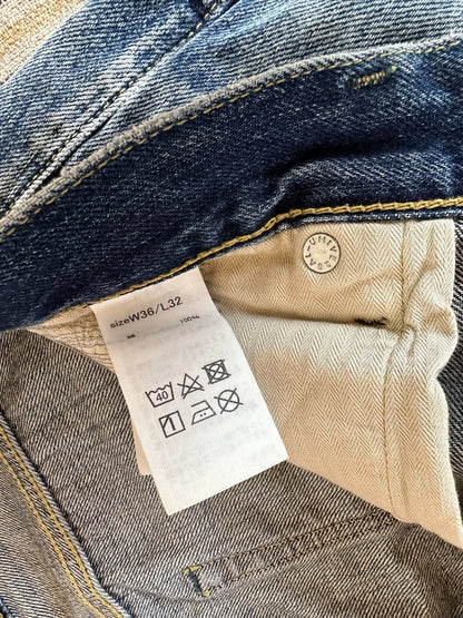 fdmtl slim fit distressed denim pants