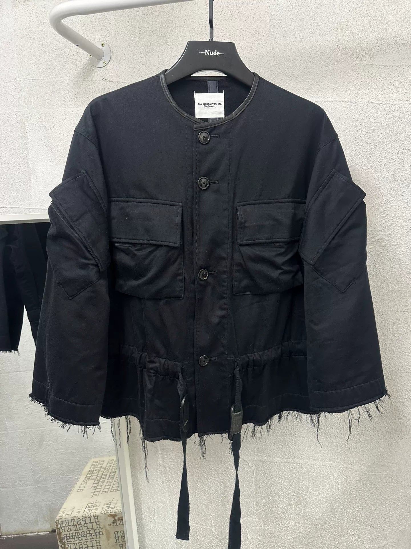 black oversized jacket with frayed hem
