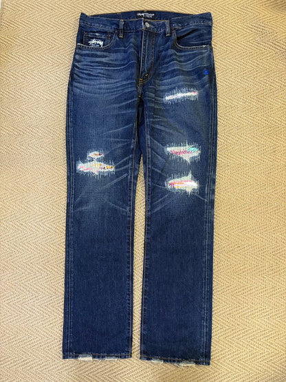 levis x stussy crush 505 distressed jeans
