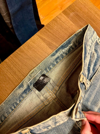 saint laurent distressed denim jeans A+