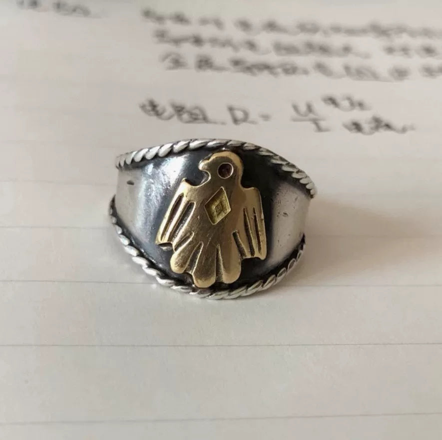 goros eagle ring with silver and gold details