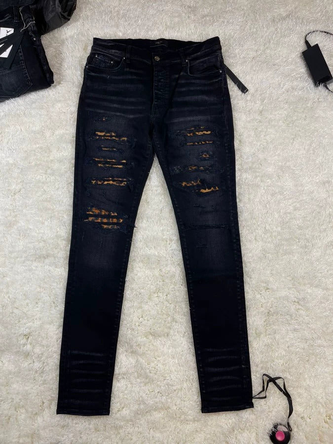 amiri leopard thrasher jean in size 34