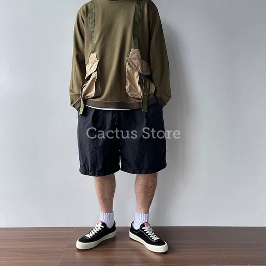 white mountaineering hunting pocket sweatshirt