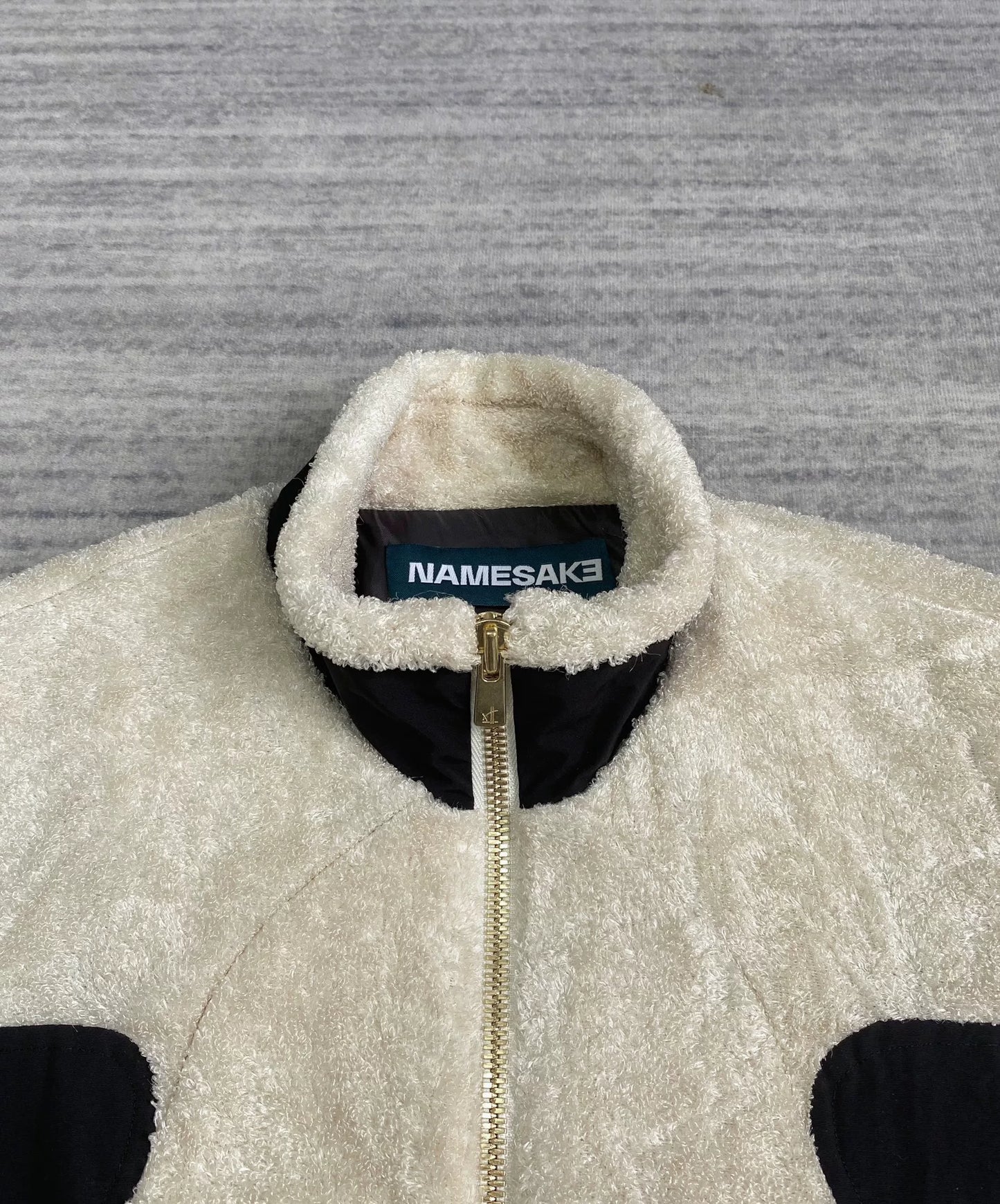black and white fleece jacket with color blocking