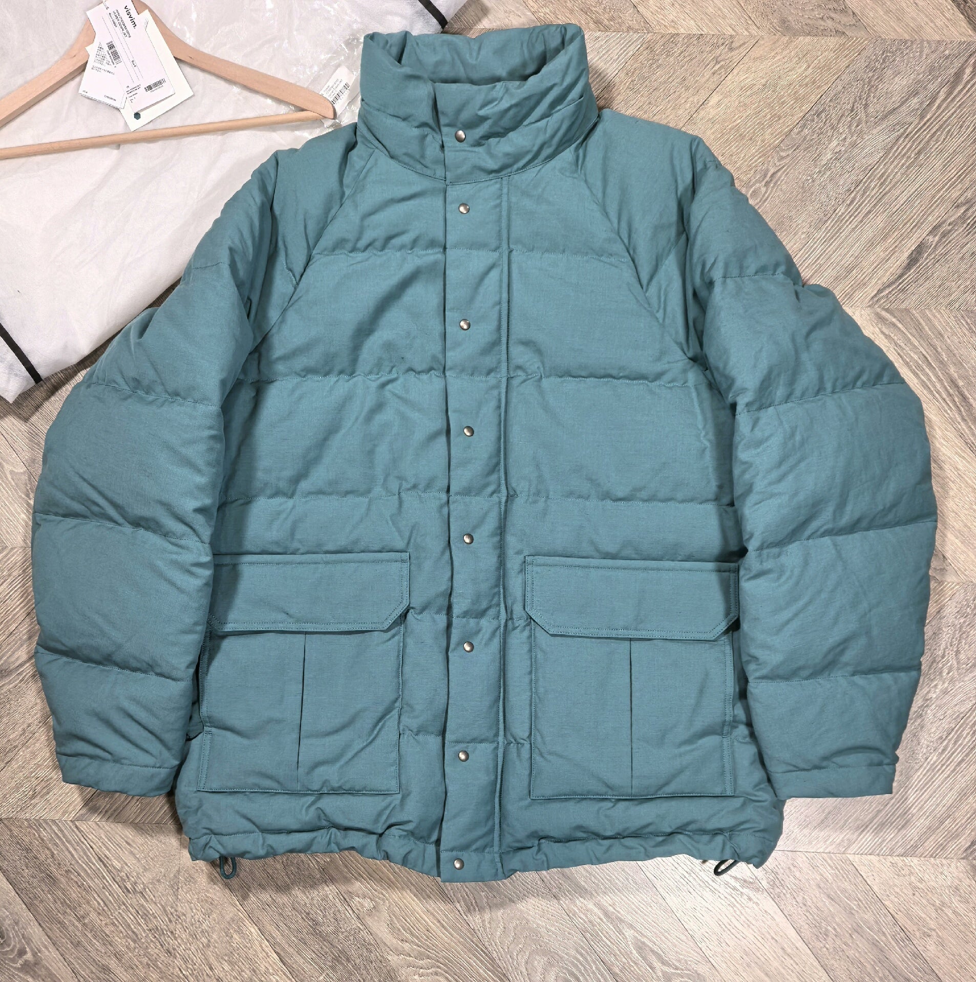 visvim ulmer down jacket in green hue